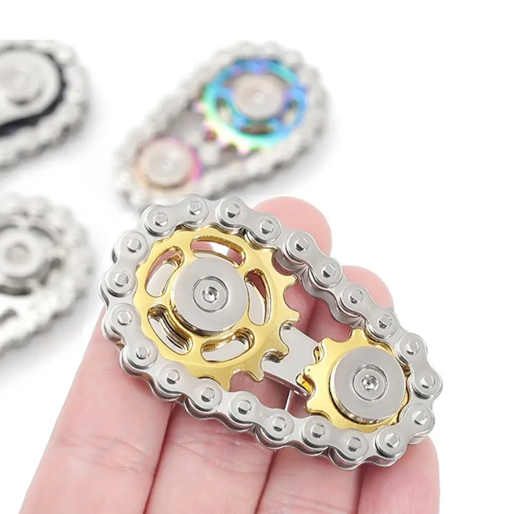 Spinner de dedo metálico con engranajes y giros antiestrés - imagen 3