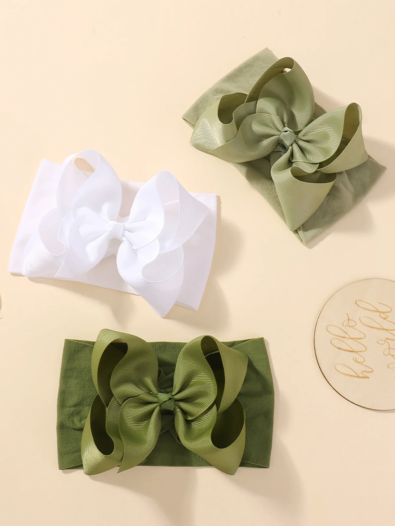 Diadema bebé niña con lazo grande de nailon para invierno - imagen 2