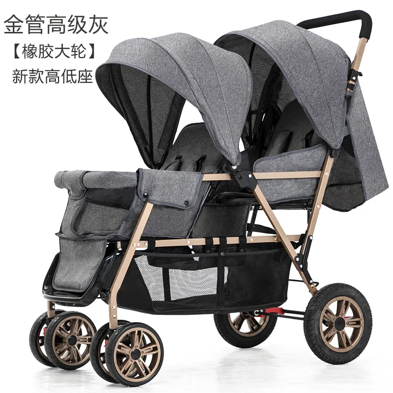 Cochecito de gemelos plegable con asientos reversibles y enfrentables