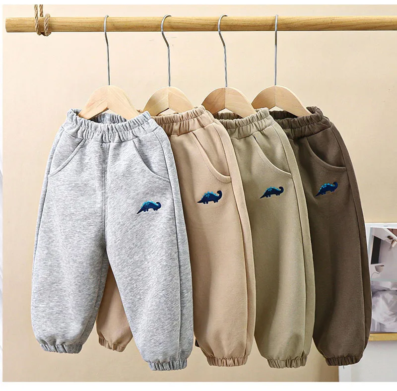 Pantalones de chándal con bordado de dinosaurio