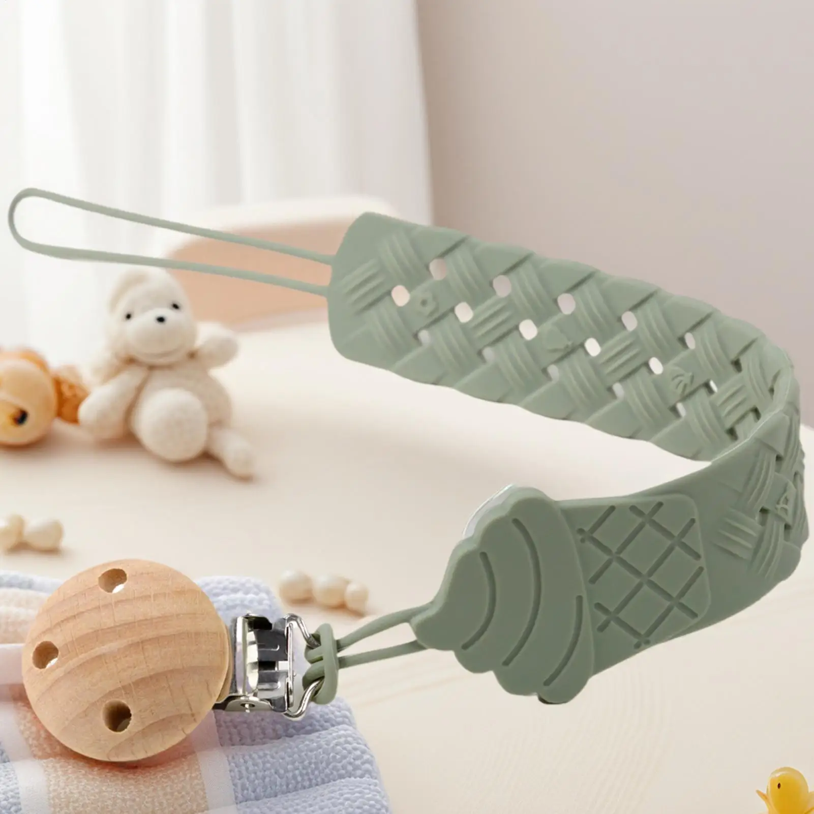 Clips para chupete con textura calmante en bebé niña