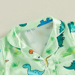 Pijama bebé con dinosaurios y cuello vuelto, manga corta