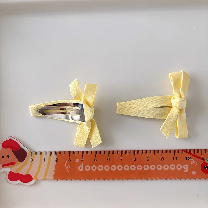 Clips de pelo con lazo de encaje beige para niñas y bebés - imagen 2