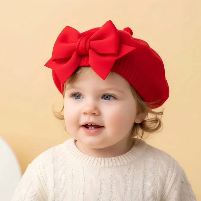 Gorro de punto con lazo para bebé niña
