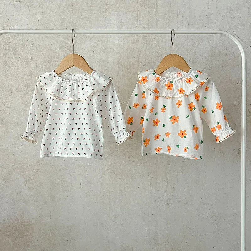 Conjunto coordinados en tonos coral y blanco