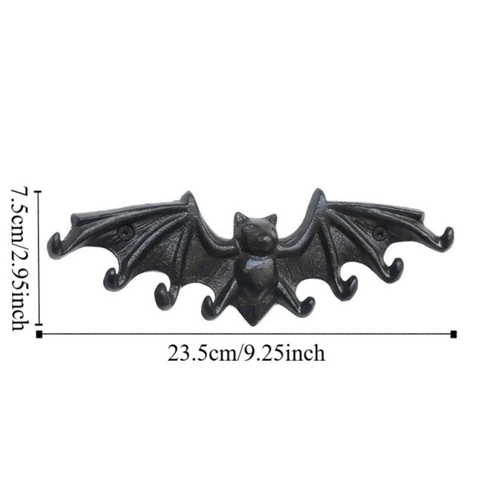 Ganchos para llaves de hierro fundido en negro con forma de murciélago