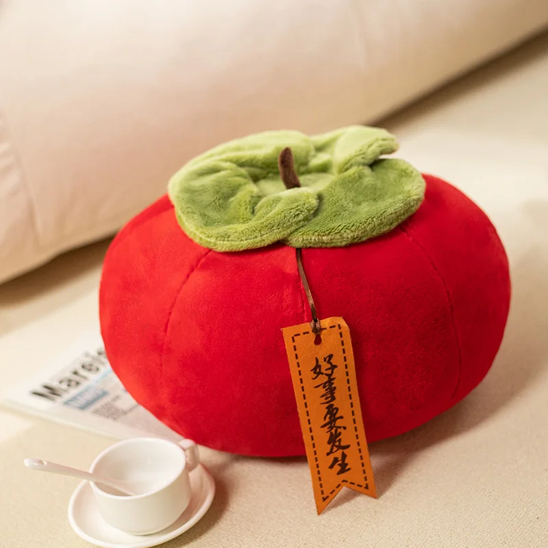 Detalle del peluche caqui amarillo naranja