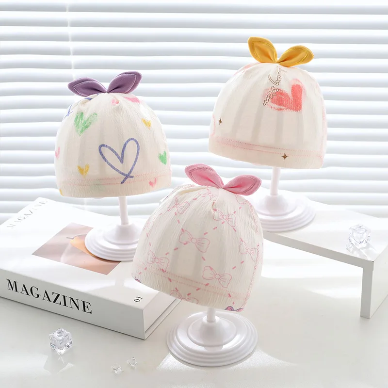 Gorro de bebé con orejas de oso y lazos de princesa