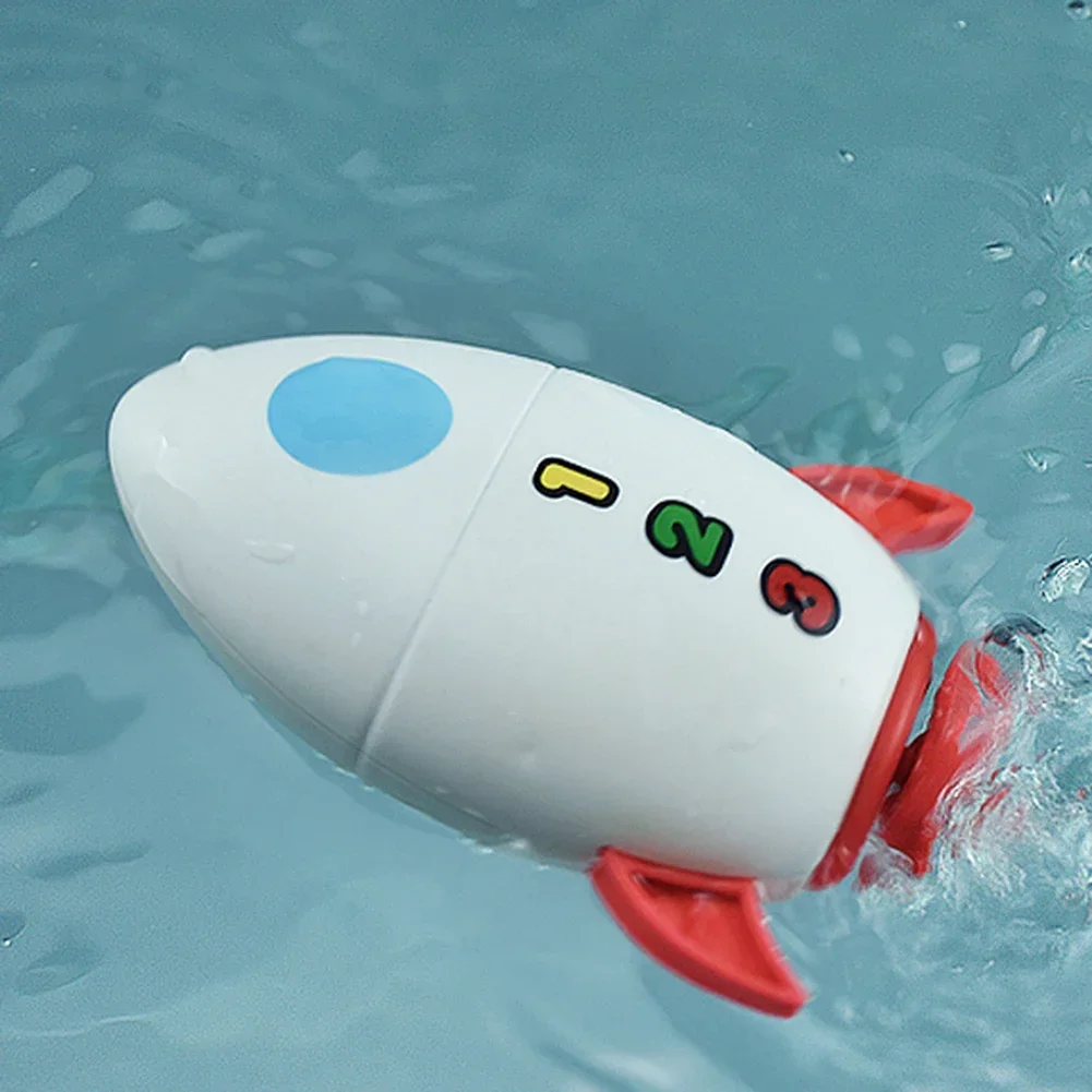 Juguete de baño cohete acuático con relojería para niños en piscina - imagen 3
