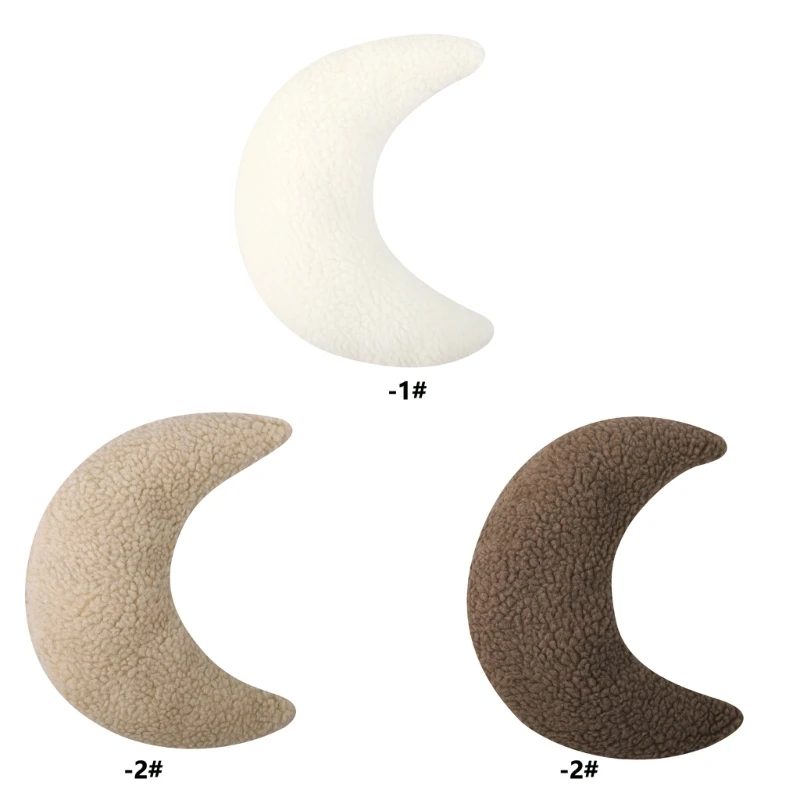 Almohada luna sobre una cuna blanca