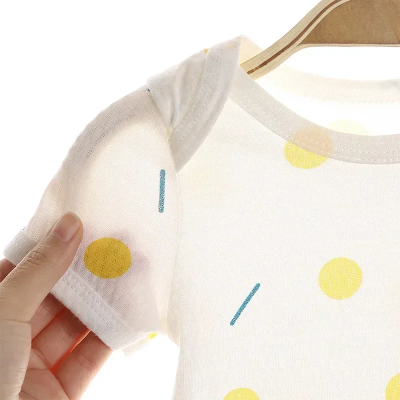 Pelele recién nacido de algodón unisex para niño y niña con pies - imagen 5