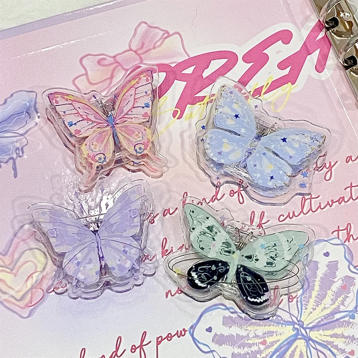 Clips mariposa acrílicos transparentes para carpetas escolares