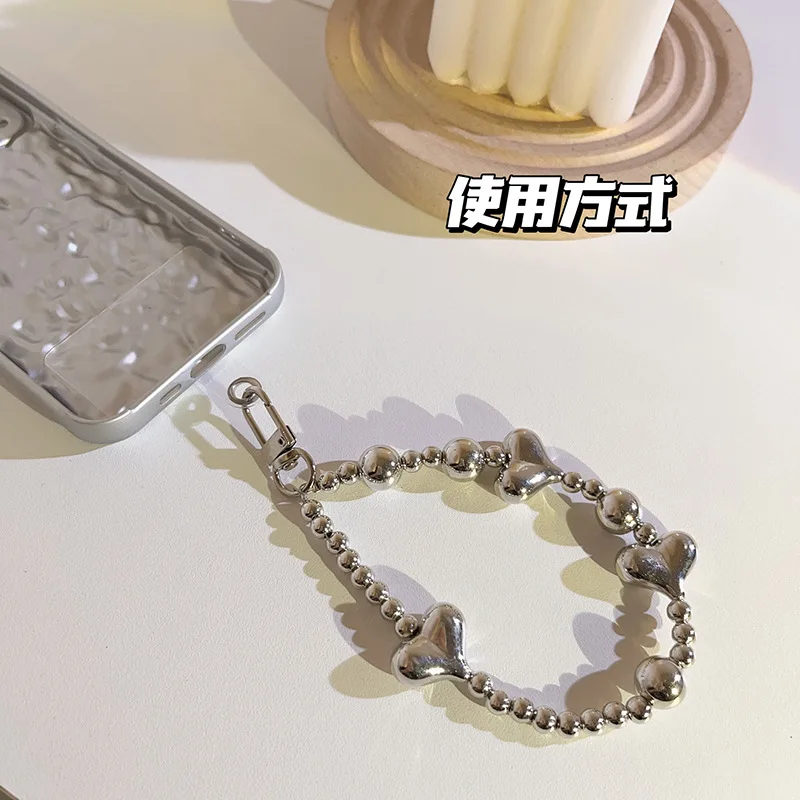 Pulsera antidesaparición para móvil con abalorios de corazón - imagen 4