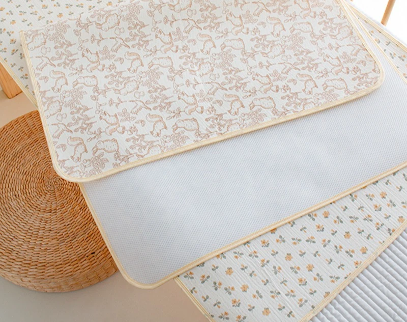Alfombrilla impermeable de algodón para cambios