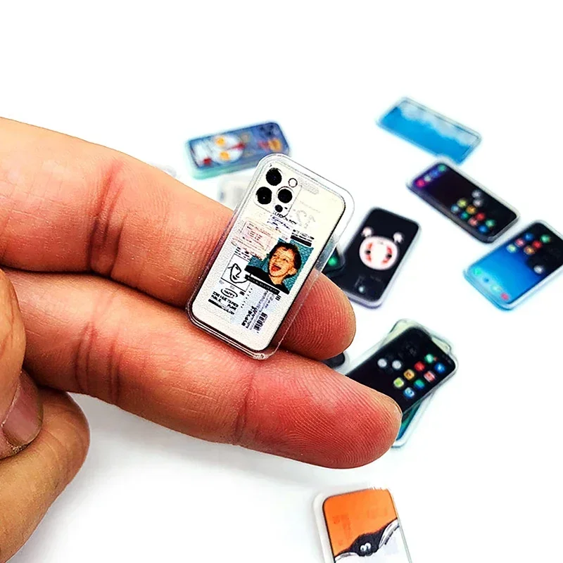 Teléfono miniatura en diferentes colores disponibles