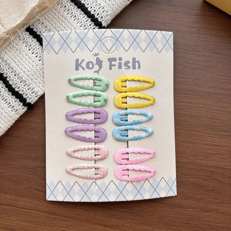 Pinzas laterales para el pelo con cuadros coloridos y ondas - imagen 2