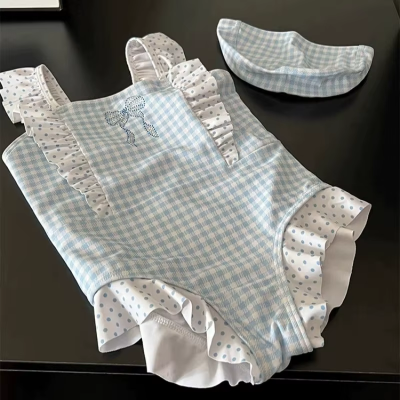 Bañador de una pieza para niña con encaje y pajarita