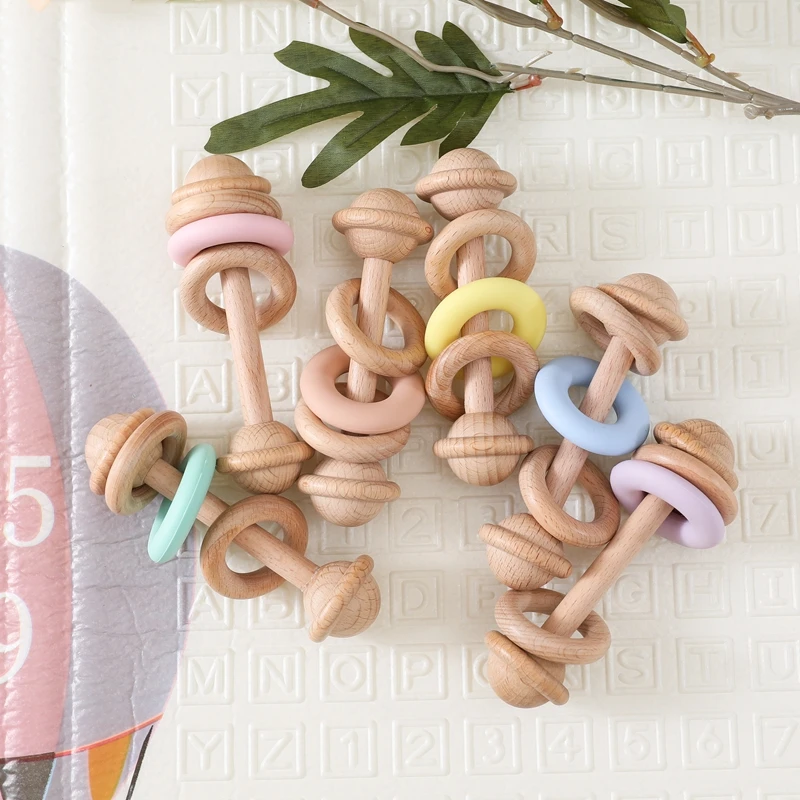 Mordedor Montessori con sonajero musical y cuentas de madera