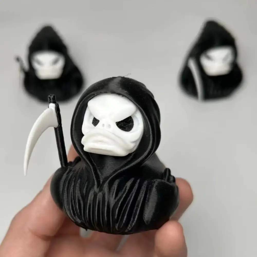 Detalle del diseño del pato Grim Reaper