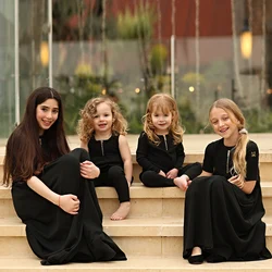 Conjunto ropa a juego familiar negro acanalado de verano bebé y niños