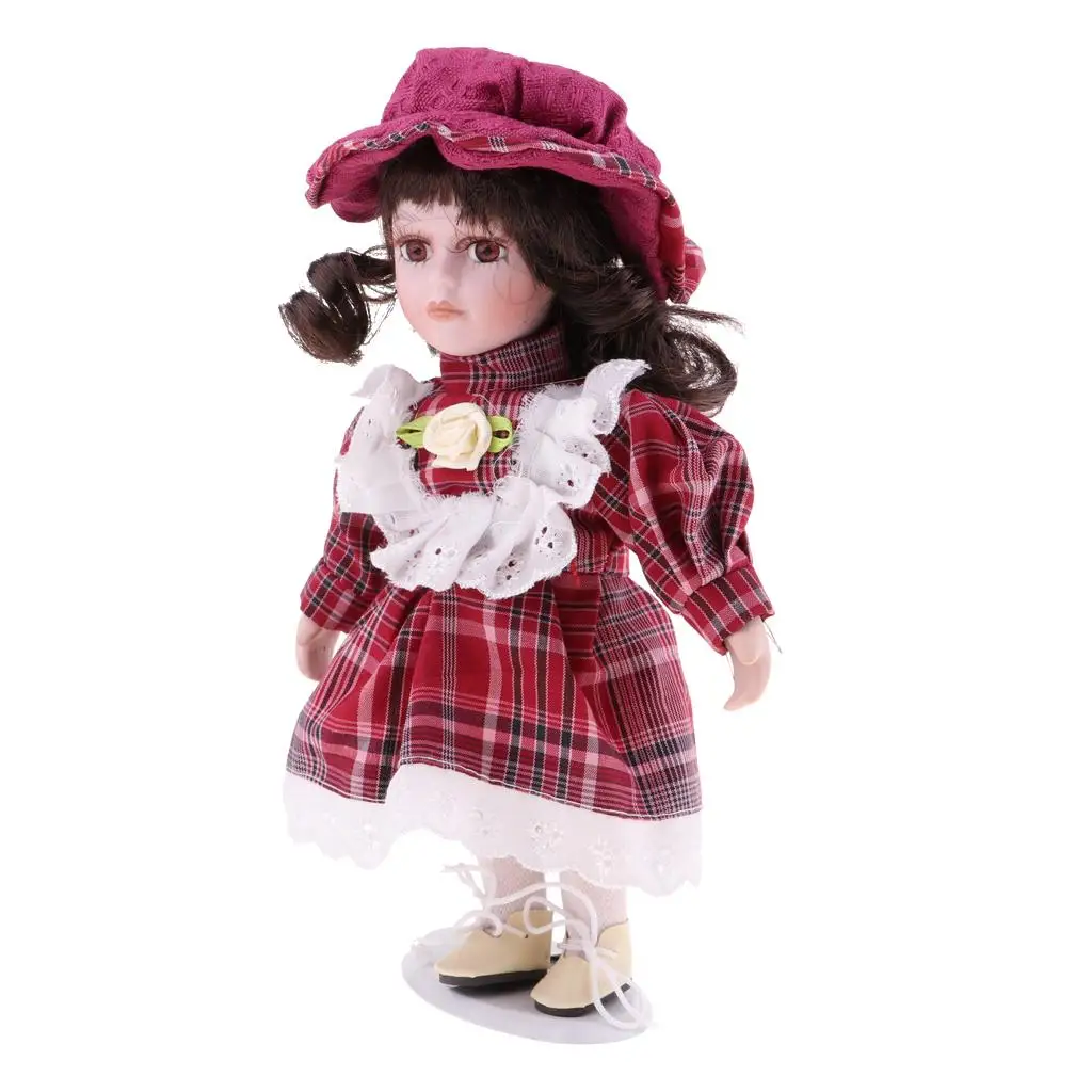 Muñeca de porcelana victoriana en miniatura con vestido rojo