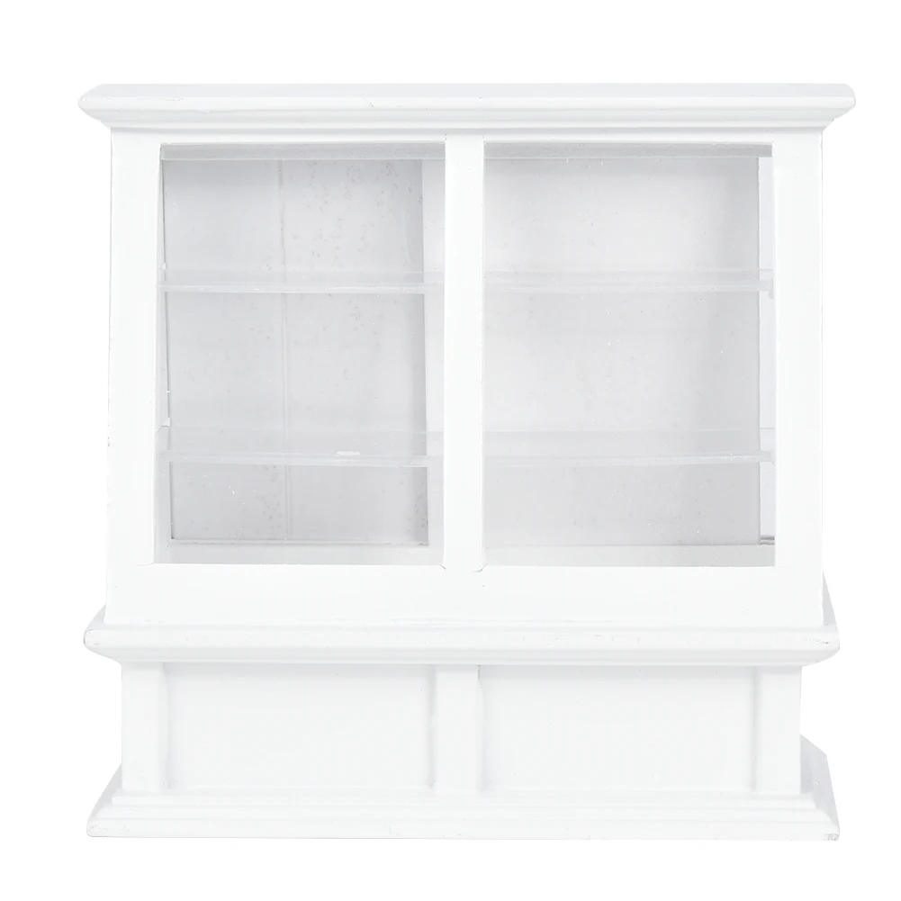 Una estantería blanca con dos estantes vacíos