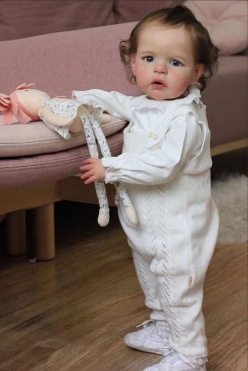 Muñeca reborn de 24 pulgadas con detalles realistas