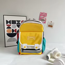 Mochila infantil retro en lona con bloques de color para escuela