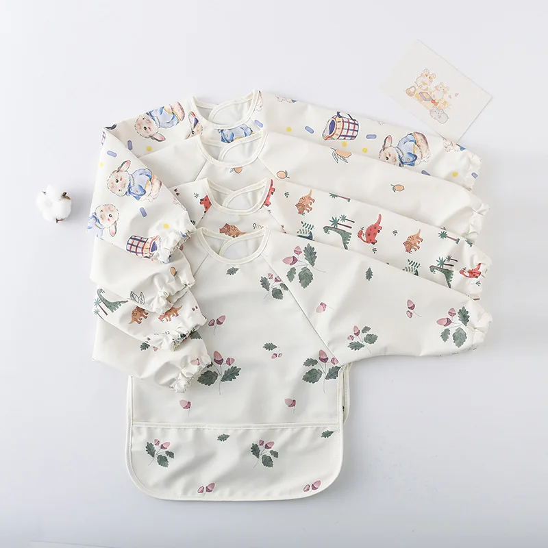 Delantal impermeable para bebé con capucha y funda de comida - imagen 4