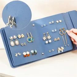 Estuche de viaje para joyas con diseño libro: anillos y pendientes