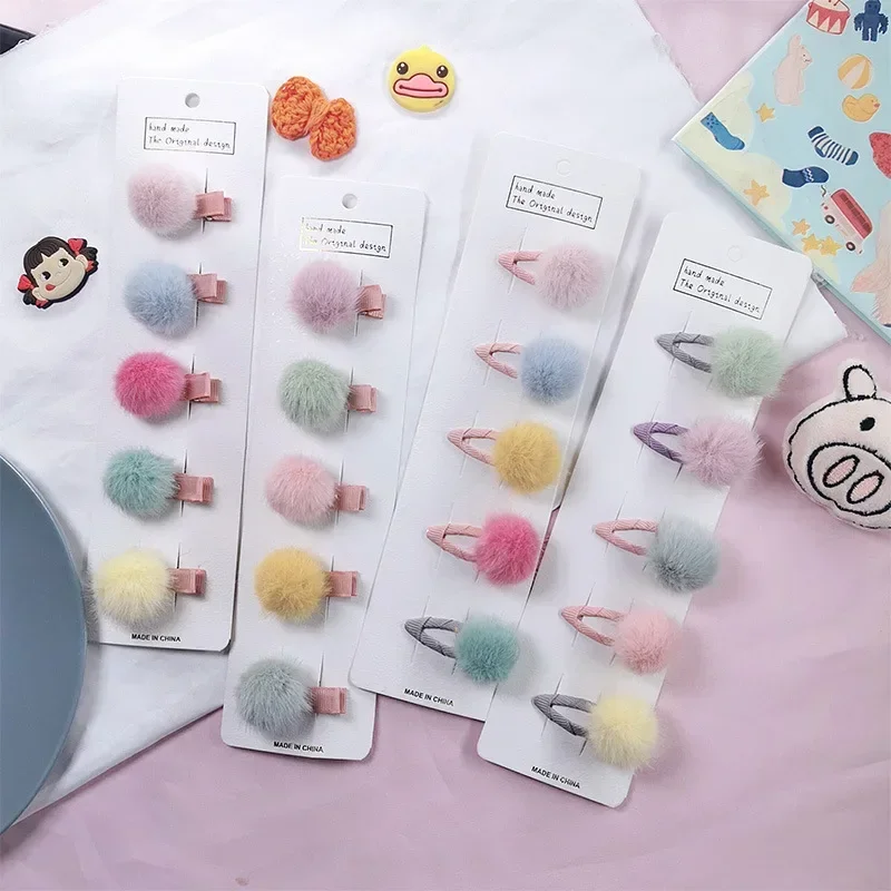 Horquillas para bebé con pompones en tonos pastel - imagen 2