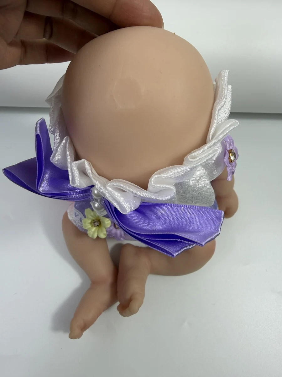 Muñeca reborn Elijah de silicona suave con boca abrible