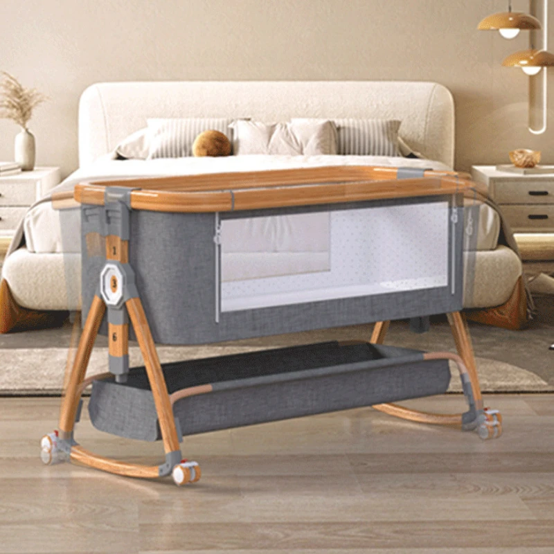 Cuna de bebé en madera con ruedas silenciosas y altura ajustable