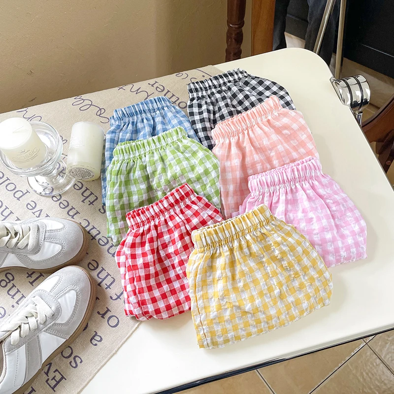 Pantalones cortos antimosquitos a cuadros para niña - imagen 2