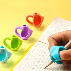 Pinza de escritura de silicona para correcta postura en primaria