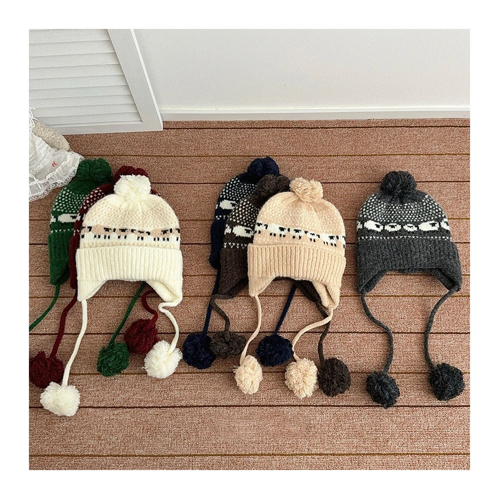 Niños con gorro de invierno de punto