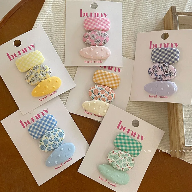 Pinzas mini ovaladas con estampado de puntos