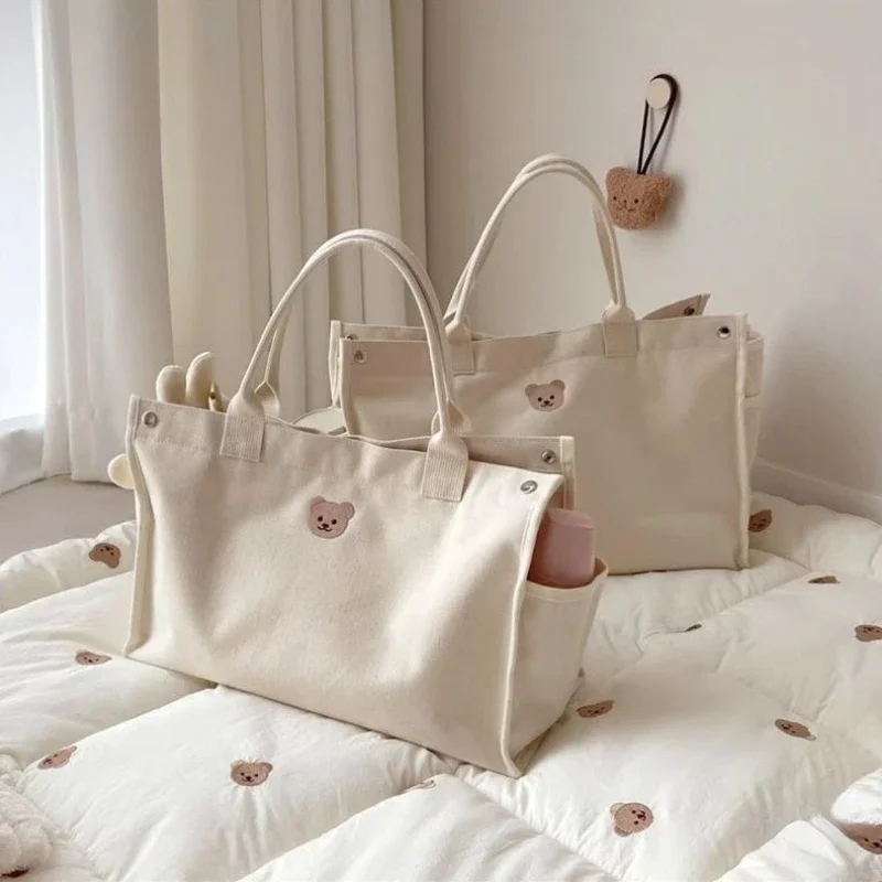 Bolsa pañalera de lona espaciosa con bolsillos para bebé - imagen 5