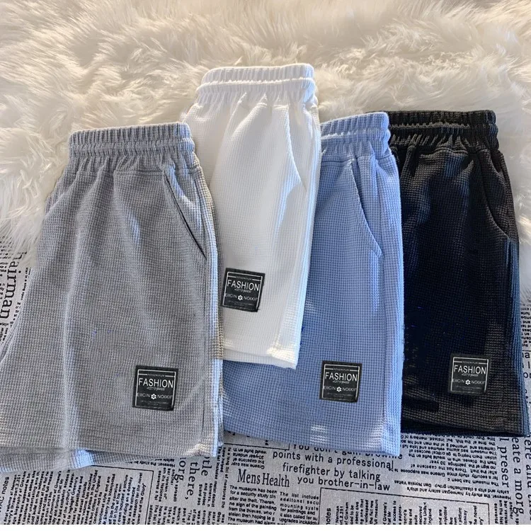 Pantalones cortos de pijama holgados con bolsillos en casa - imagen 2