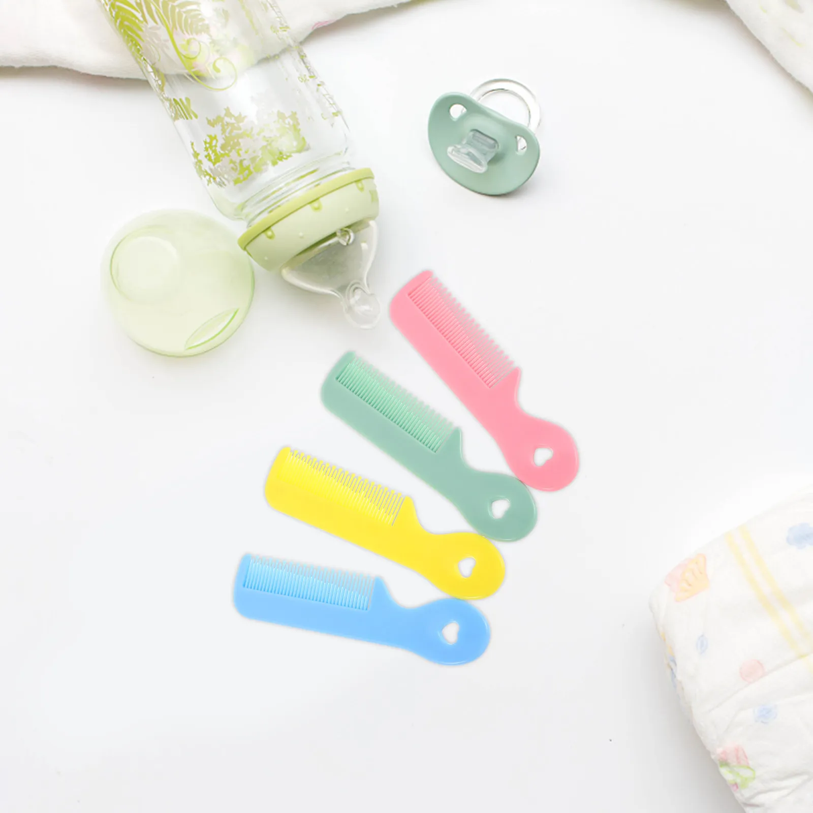 Mini peine redondo de colores para masaje del cuero cabelludo infantil - imagen 4